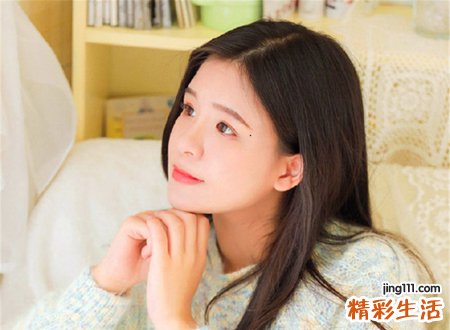 女人左眼尾下面有颗痣
